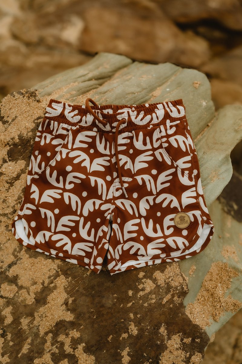 Product shot The Coral Board shorts by Australia's newest on trend surf brand for boys, Kohvi Kids.